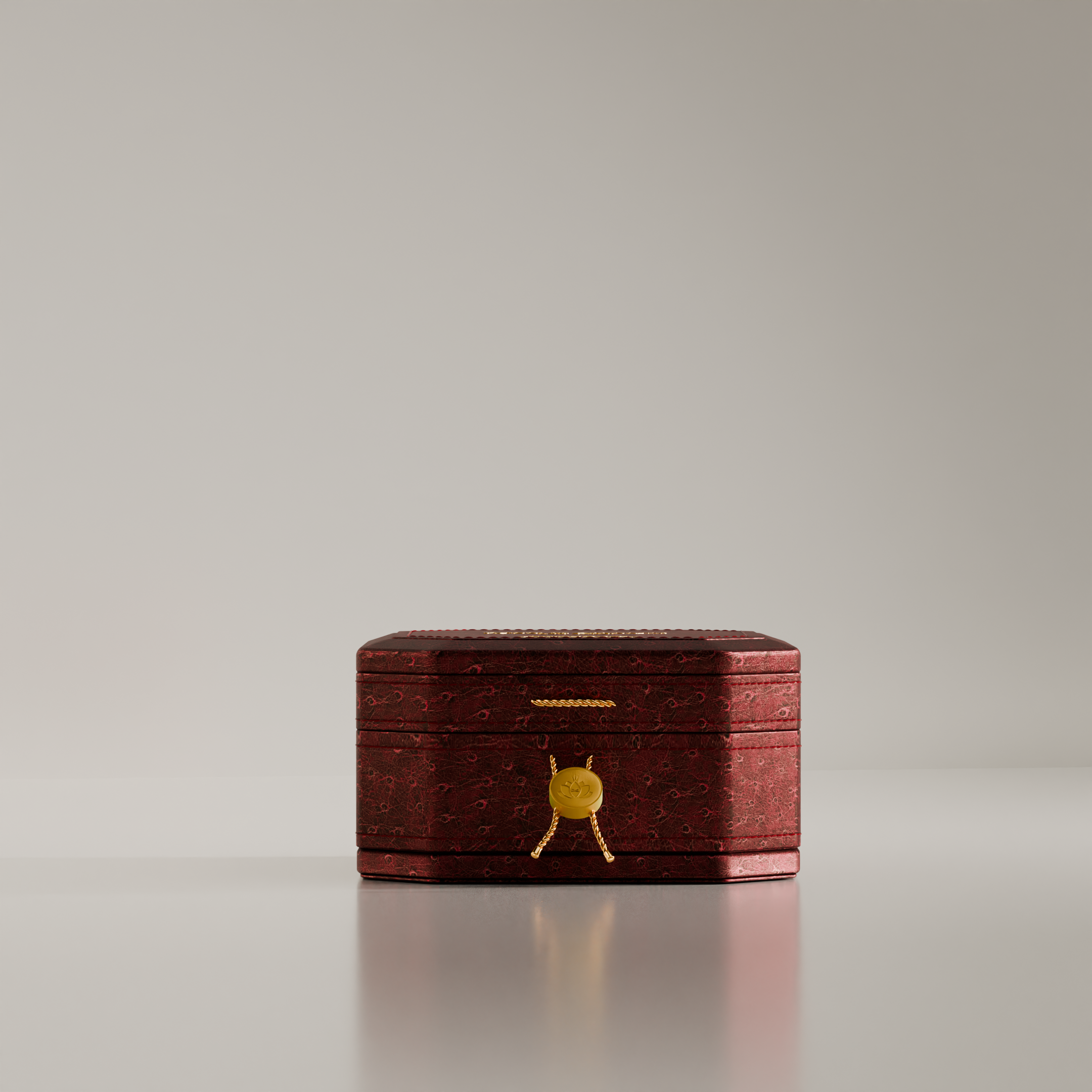 An oud box with a red and gold design that contains a blue oud rare agarwood oud labeled ‘Blue Oud,’ indicating the scent of the product.