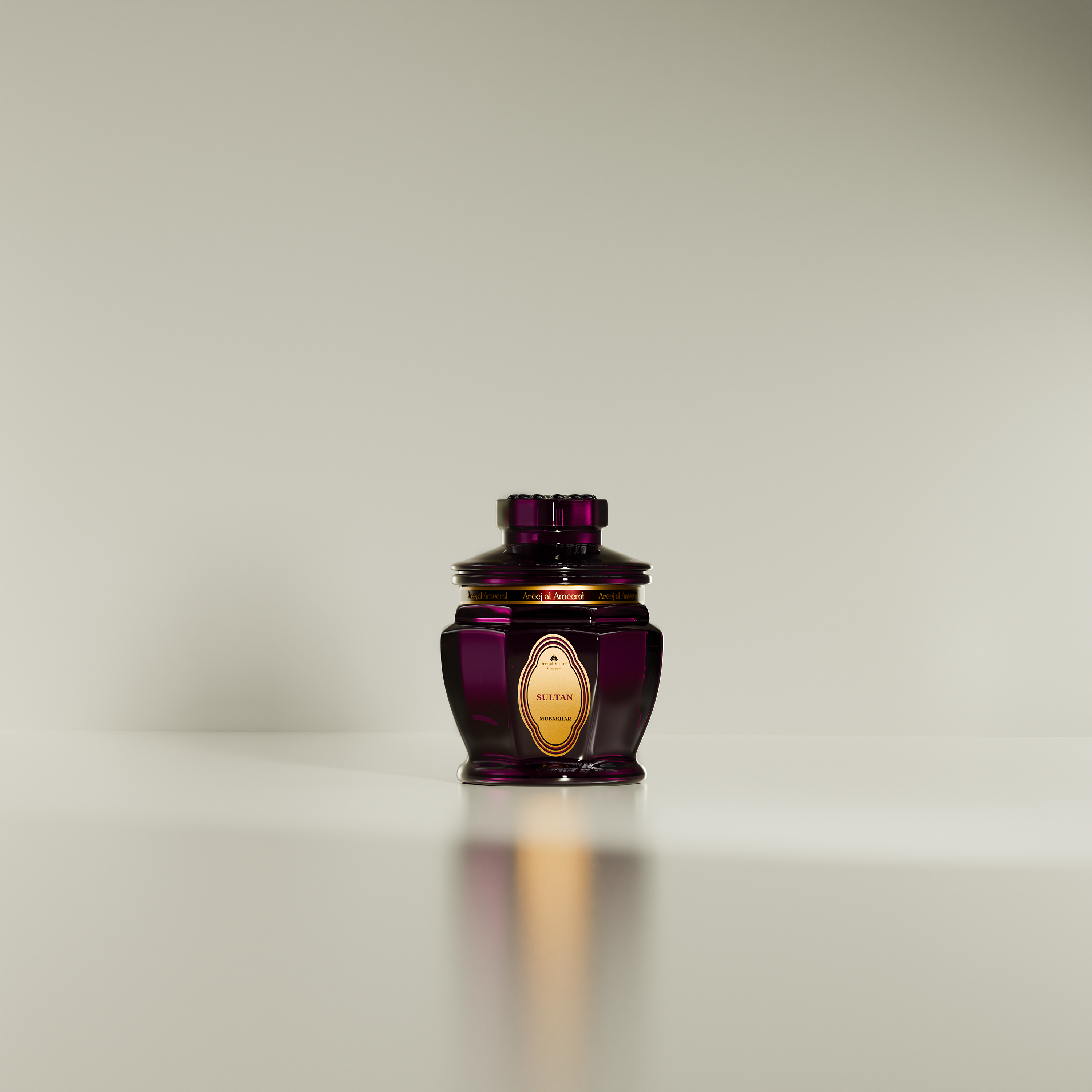 Colored glass jar with a label, containing Oud_Mubakhar_Sultann, against a light background.